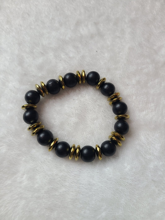 Black wood and gold spacer bracelet