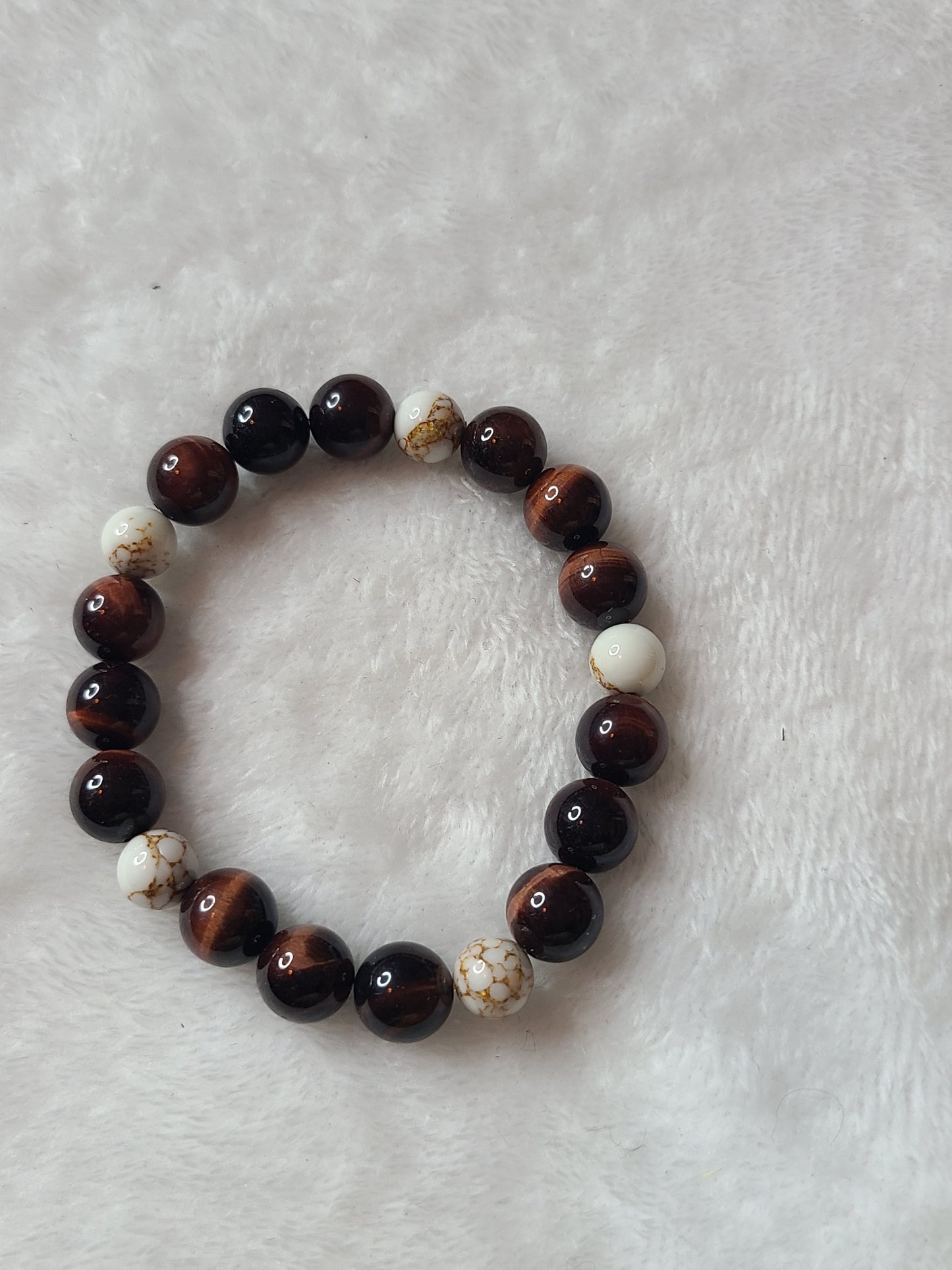 Red Tigger eye and Gold Howlite bracelet